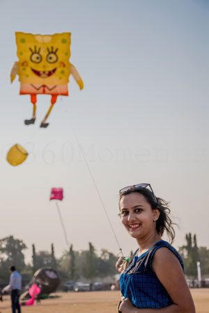 women flying kite