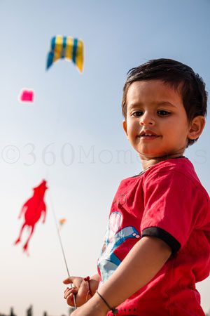 kid flying kite