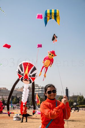 girl flying kite