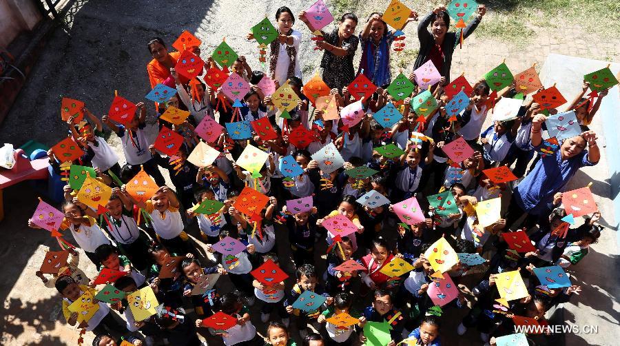 Nepali people with kites during Dashain festival — community kite flying celebration Nepal